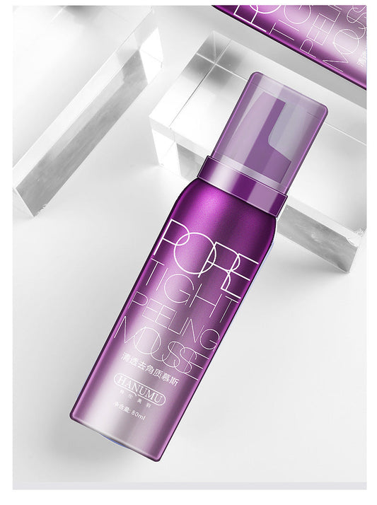 Purple skincare product bottle on a white background