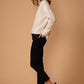 Women's Turtle Neck Fringe Sweater Top in Natural