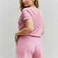 Zenana Chilled Out Full Size Short Sleeve Romper in Light Carnation