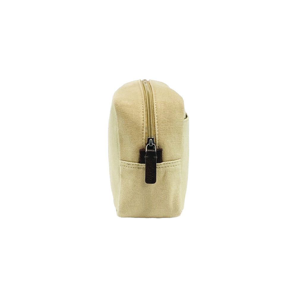 Beige toiletry bag with a black zipper on a white background