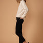 Women's Turtle Neck Fringe Sweater Top in Natural