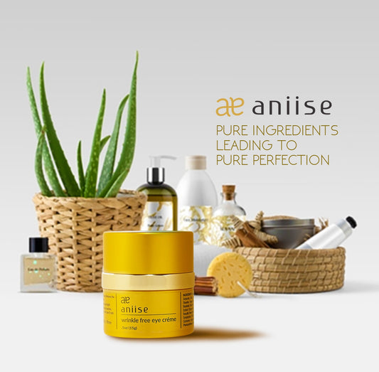 Aniise skincare products with a plant and bowls on a light background